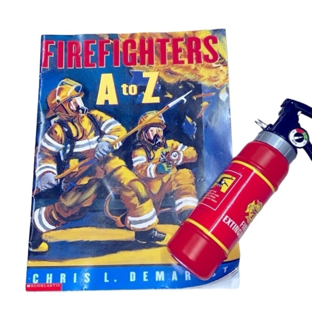 Firefighters A-Z scholastic kids book with plastic toy fire extinguisher